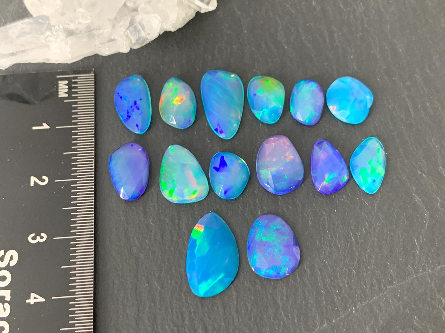 Faceted Blue Ethiopian Opal 8-14mm long cabochon