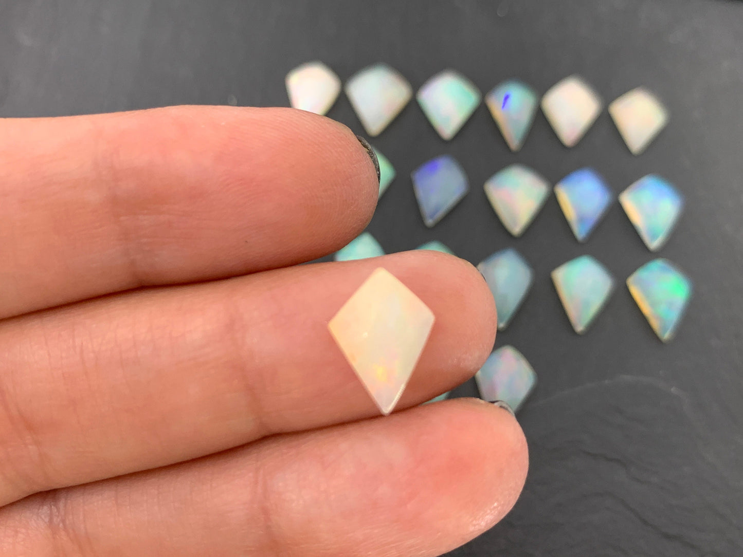 Faceted Ethiopian Opal kite 12-12.5mm long cabochon