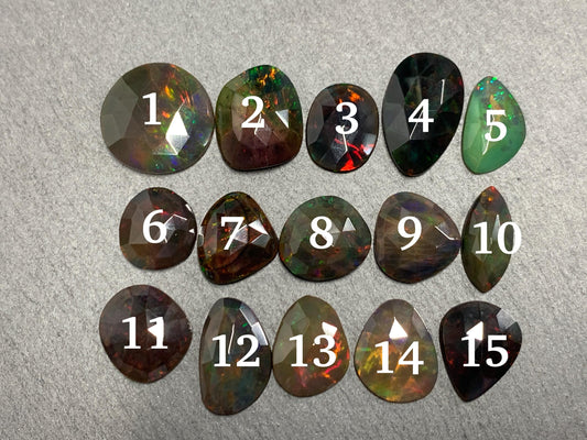 Faceted Black Ethiopian Opal 15-20mm long cabochon