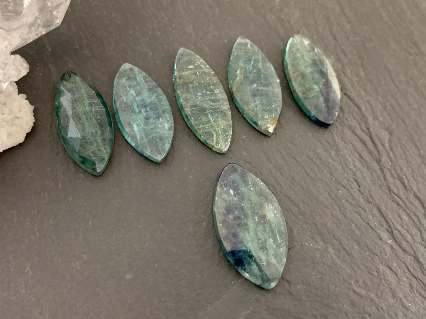 Faceted Emerald Green Kyanite marquise 21-22mm long cabochon