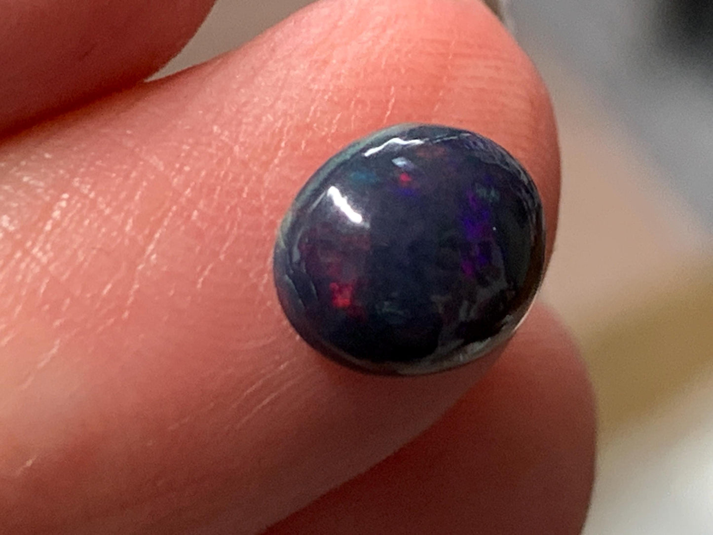 Natural Ethiopian Black Opal 7x9x4mm cabochon