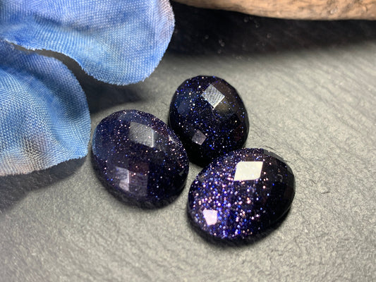 Faceted Blue Gold Sand Oval 12x16mm cabochon