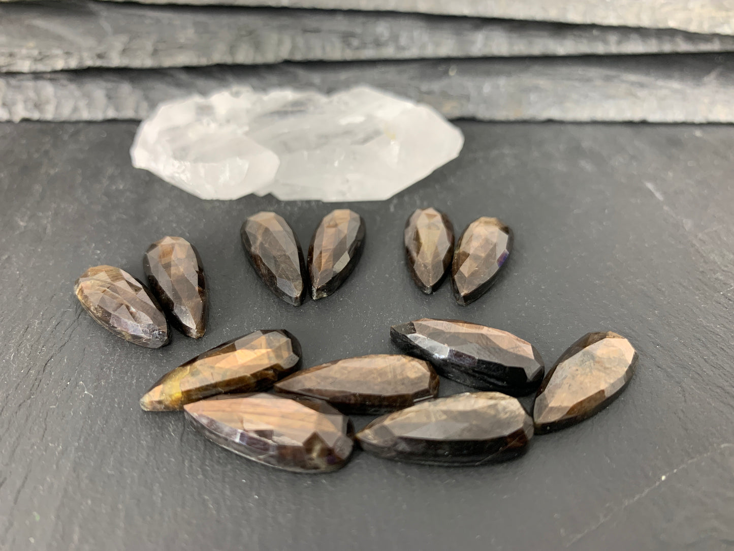 Faceted Star Sapphire pear 8x20mm cabochon
