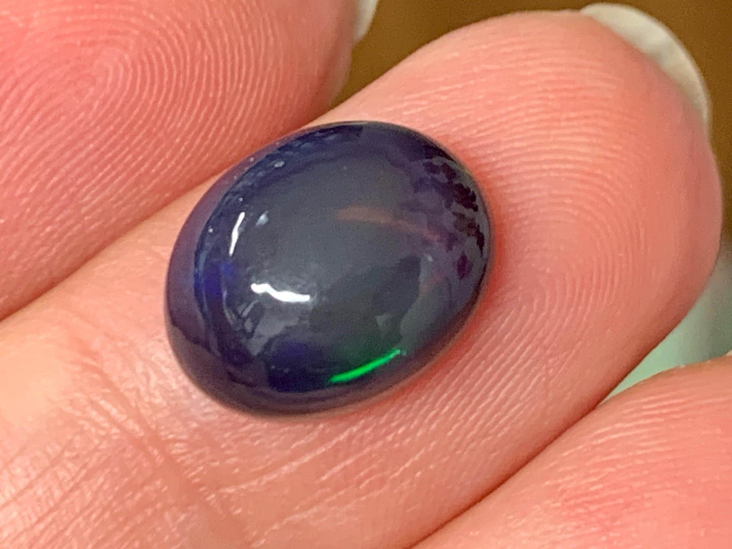Natural Ethiopian Black Opal 9x12x6mm cabochon