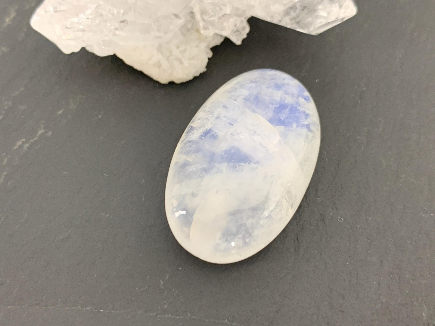 Rainbow Moonstone oval 29x18x8mm cabochon