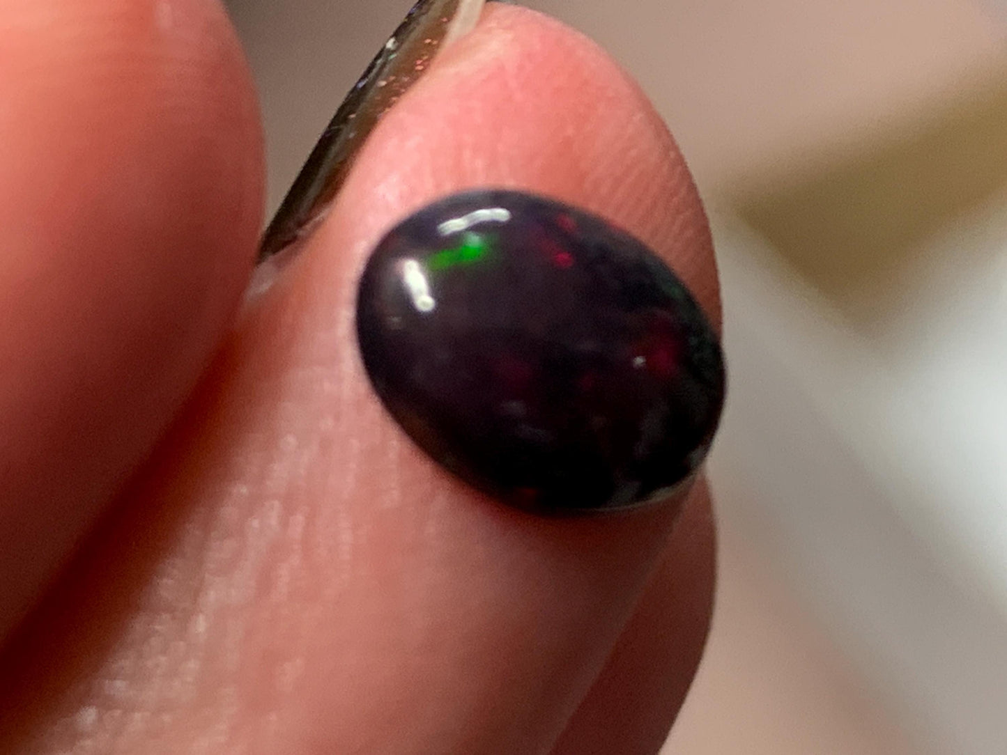 Natural Ethiopian Black Opal 7x9x3mm cabochon