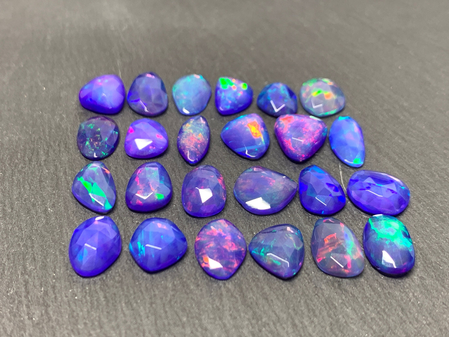 Faceted Purple Ethiopian Opal 10-11mm cabochon