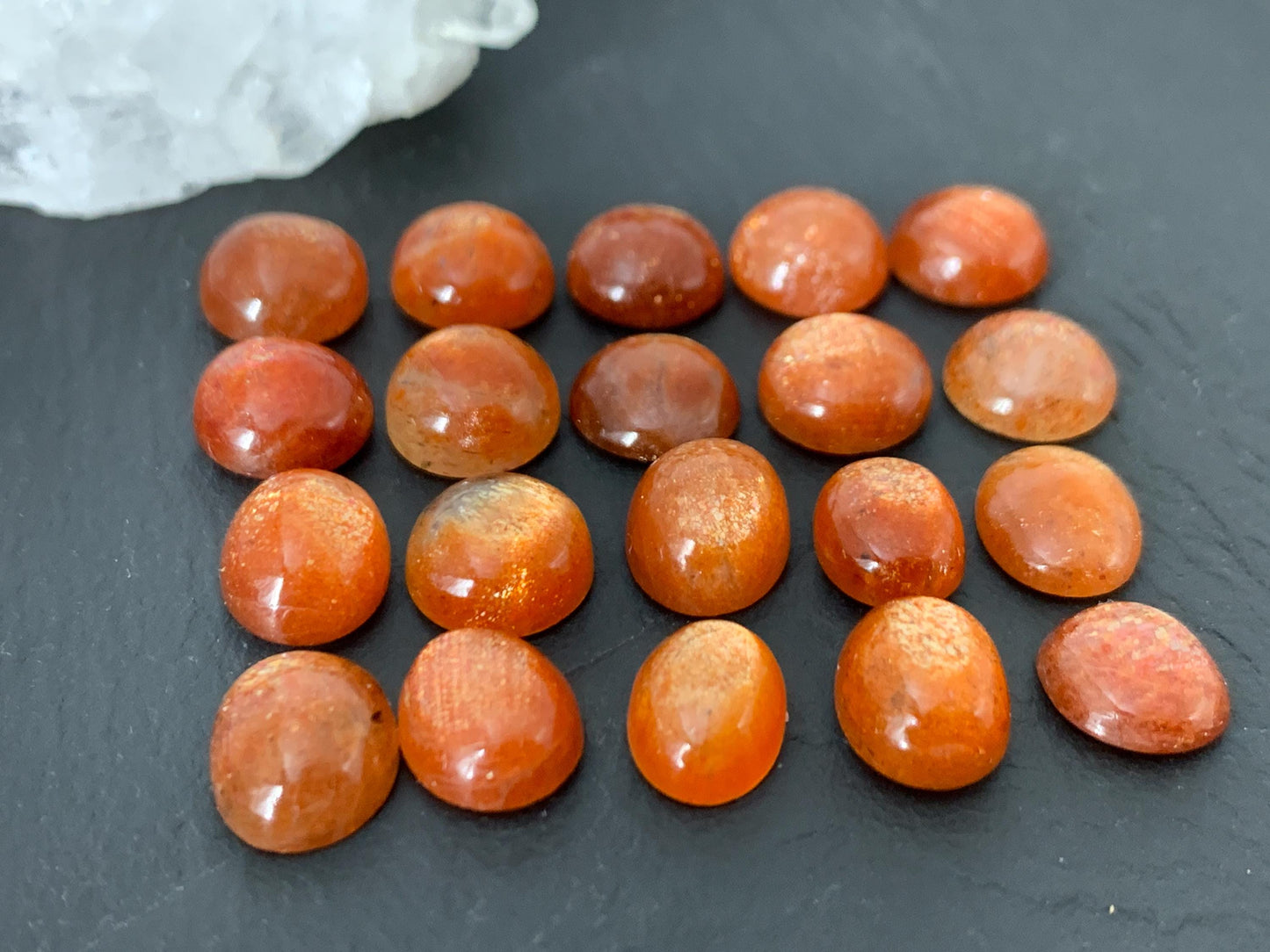 Sunstone round, oval 9-10mm long cabochon