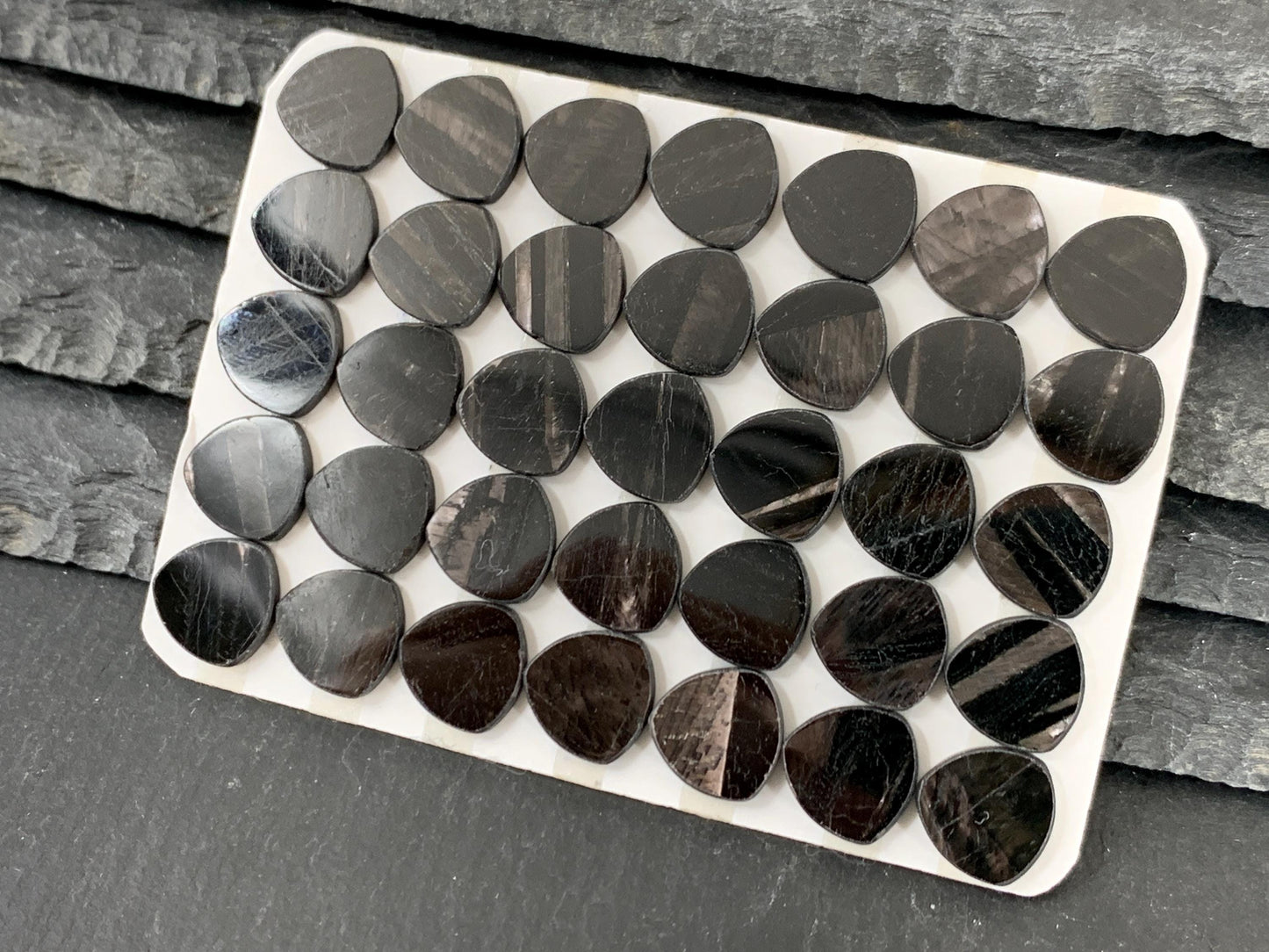 Flat Hypersthene curved triangle 10mm cabochon - Calibrated cabochons