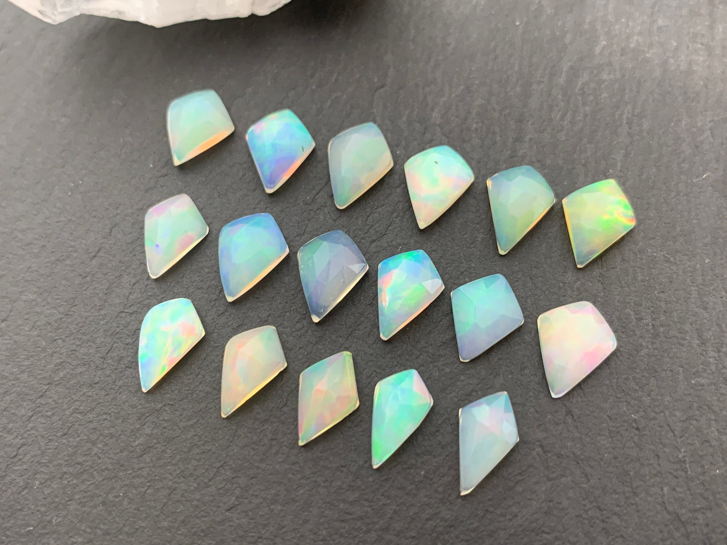 Faceted Welo Opal kite 10-10.5mm cabochon