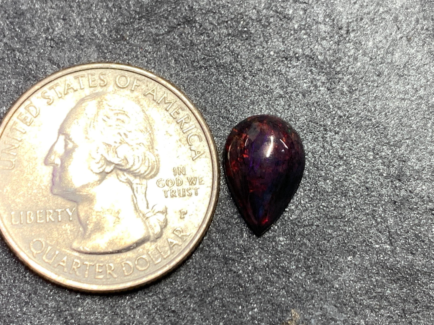 Black Ethiopian Opal pear 8x13x4mm cabochon