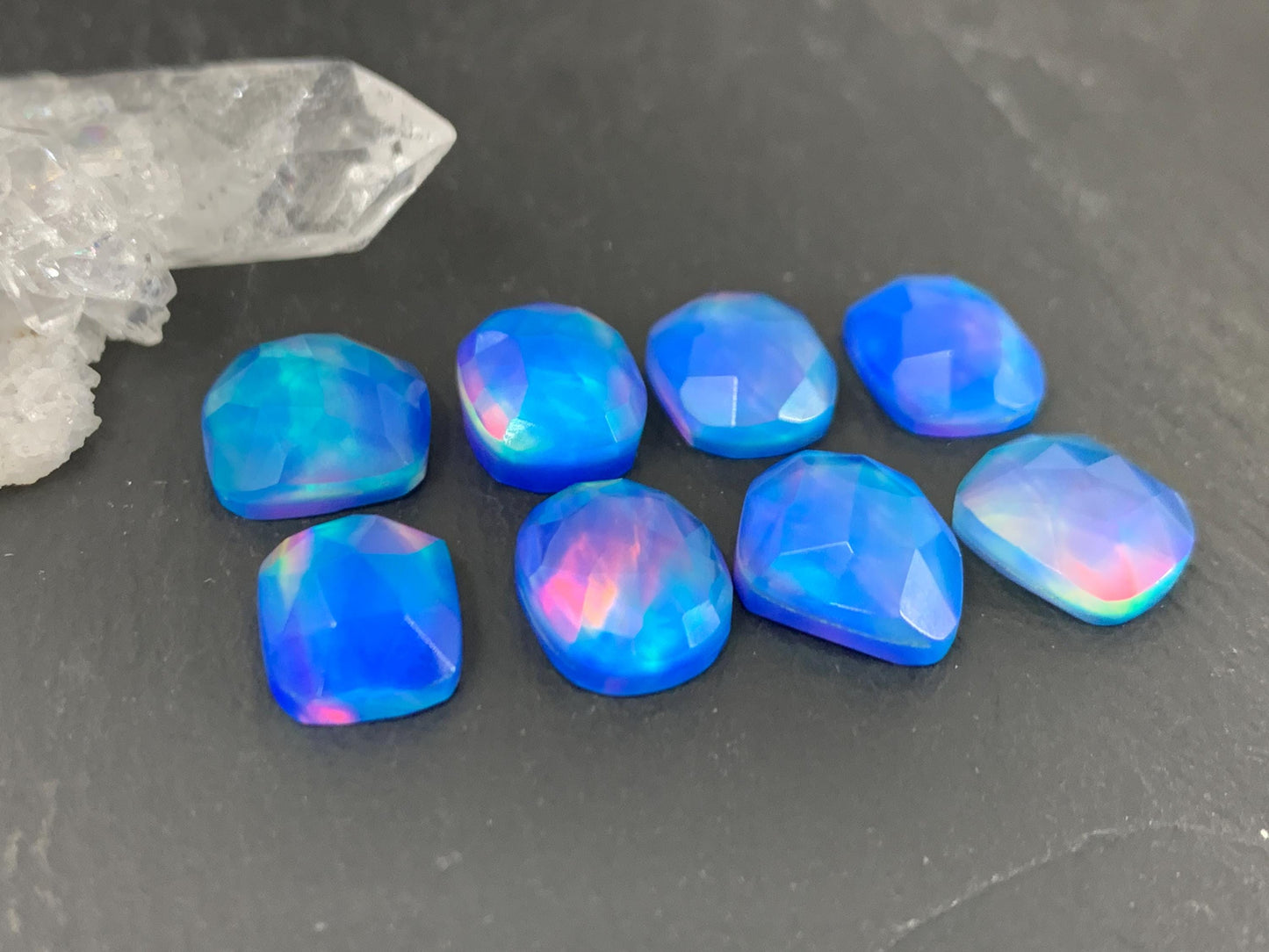 Faceted Aurora Opal free form 10-11mm long doublet cabochons