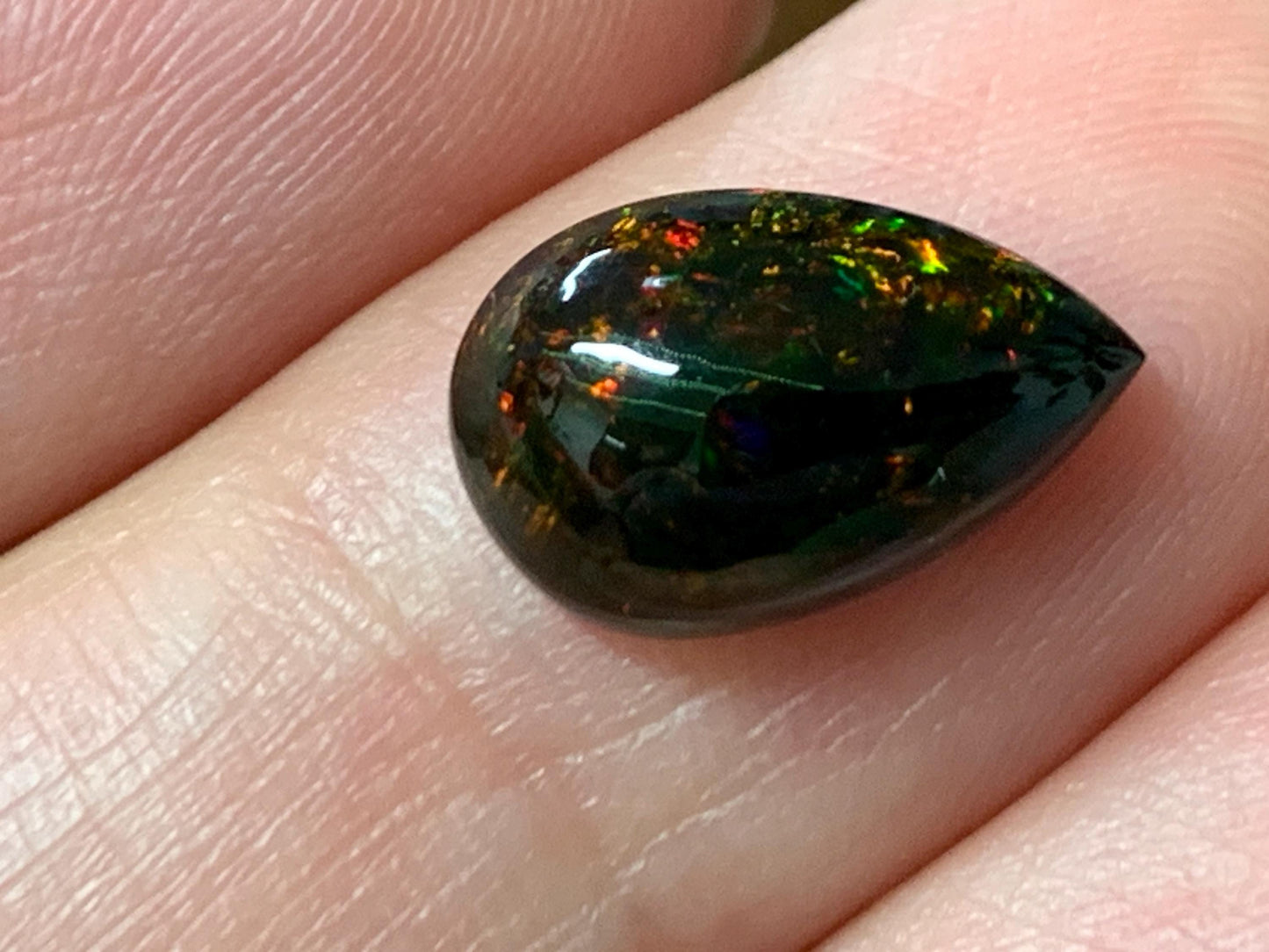 Natural Ethiopian Black Opal 8x12x4mm cabochon