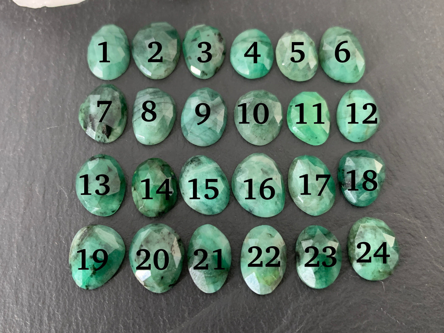 Faceted Emerald oval 11-13mm long cabochon