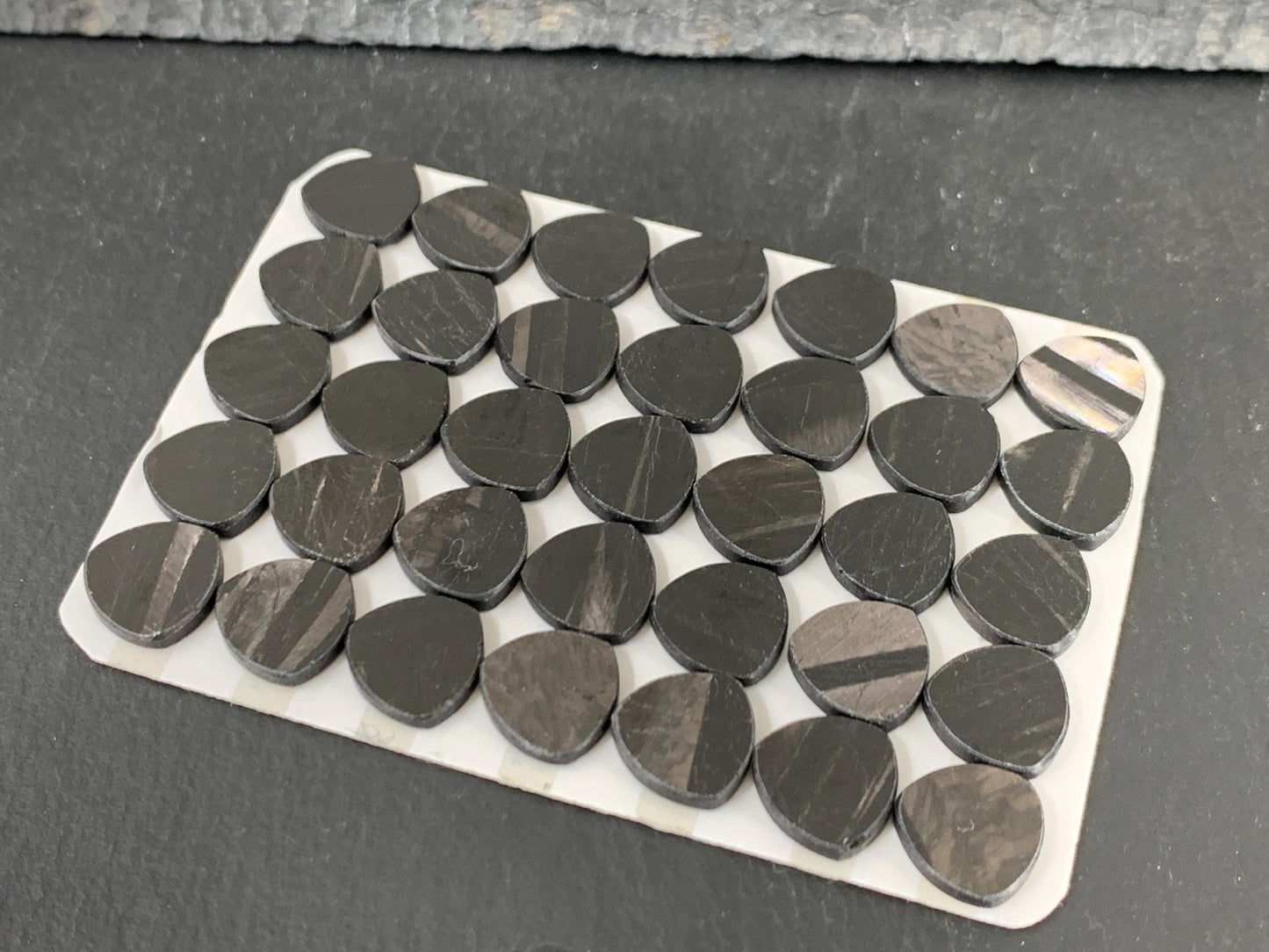 Flat Hypersthene curved triangle 10mm cabochon - Calibrated cabochons