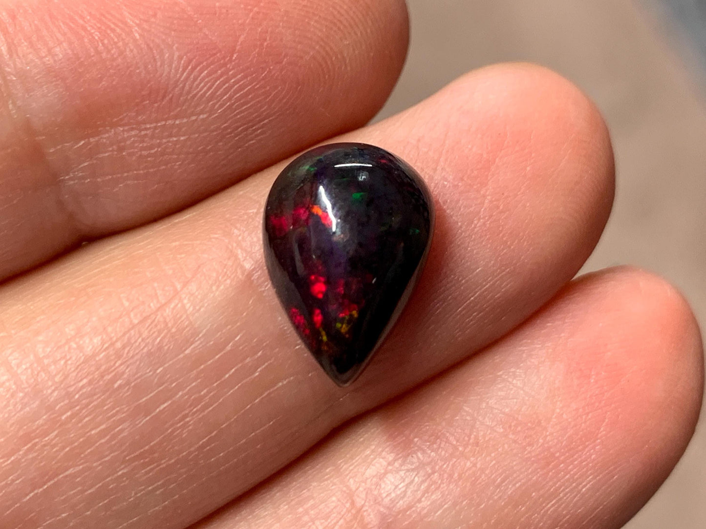 Black Ethiopian Opal pear 9x13x5mm cabochon