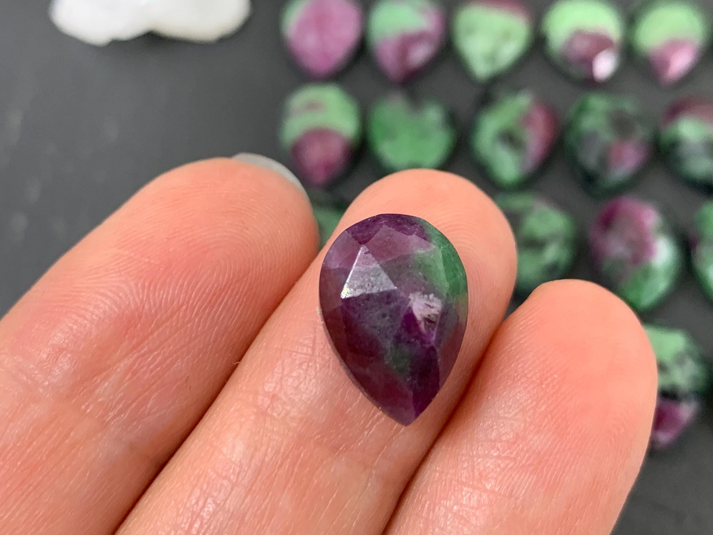 Faceted Ruby Zoisite pear 10x14mm cabochon