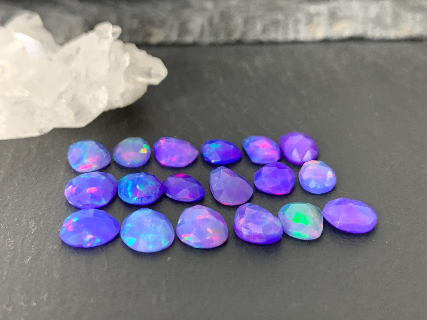 Faceted Purple Ethiopian Opal 7-8mm cabochon