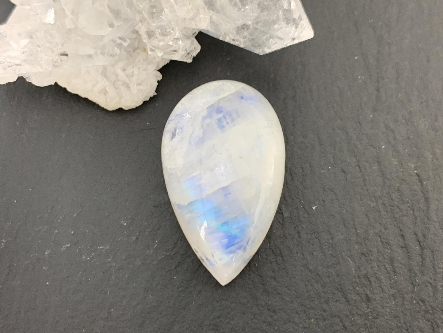 Rainbow Moonstone 26x16x8mm cabochon