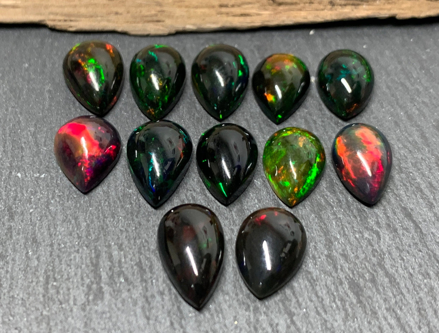 Black Ethiopian Opal pear 12-13mm long cabochon