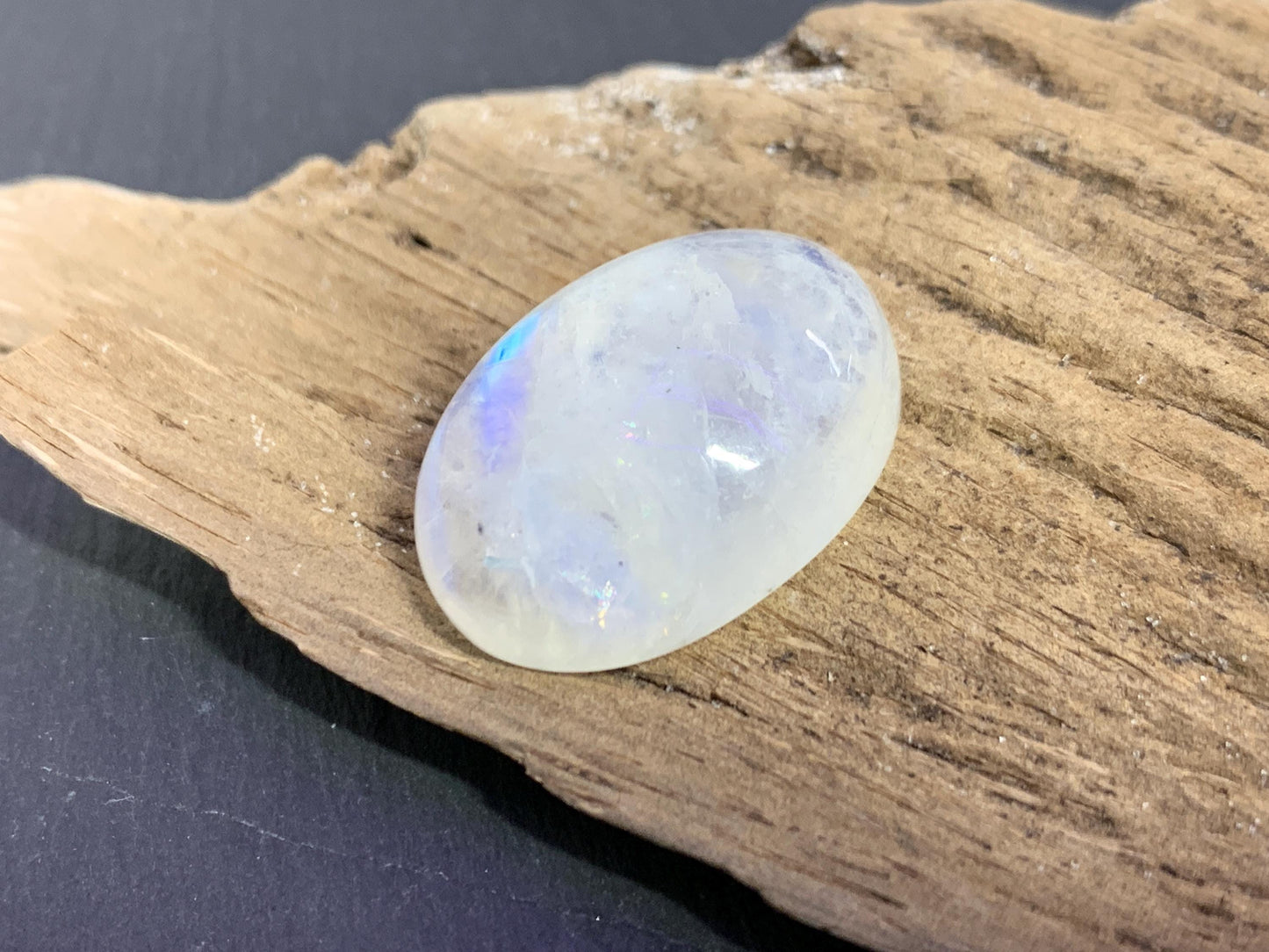 Rainbow Moonstone oval 24x18x9mm cabochon