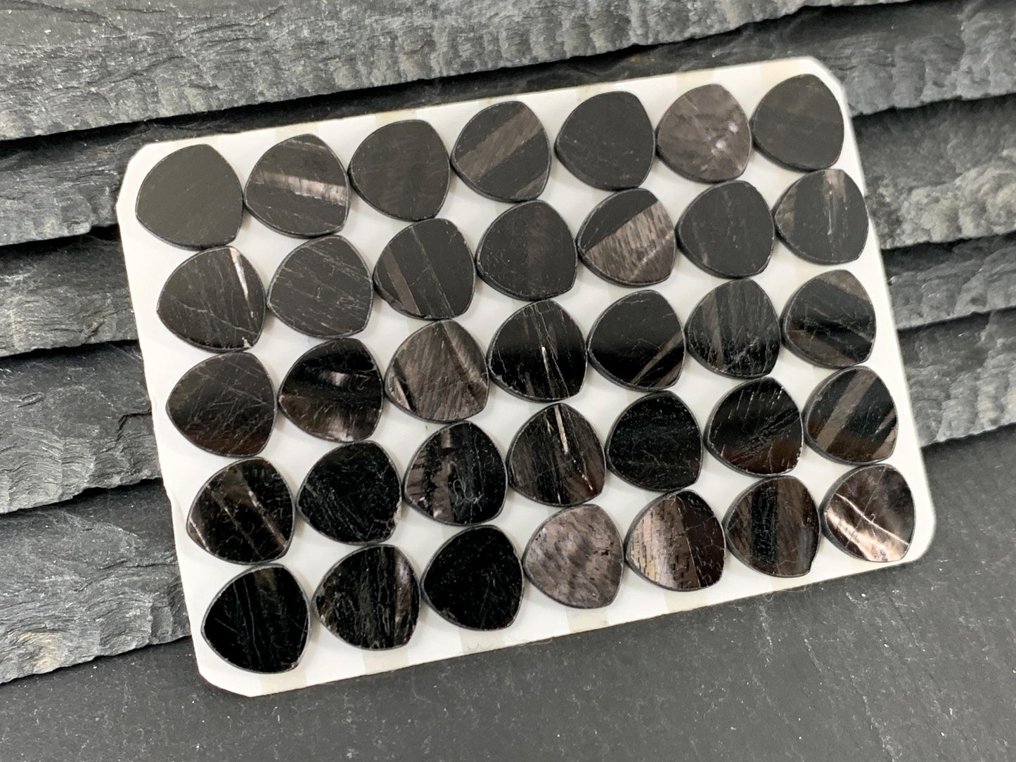 Flat Hypersthene curved triangle 10mm cabochon - Calibrated cabochons