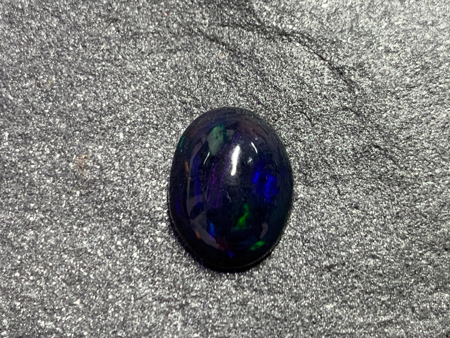 Black Ethiopian Opal oval 9x11x4mm cabochon