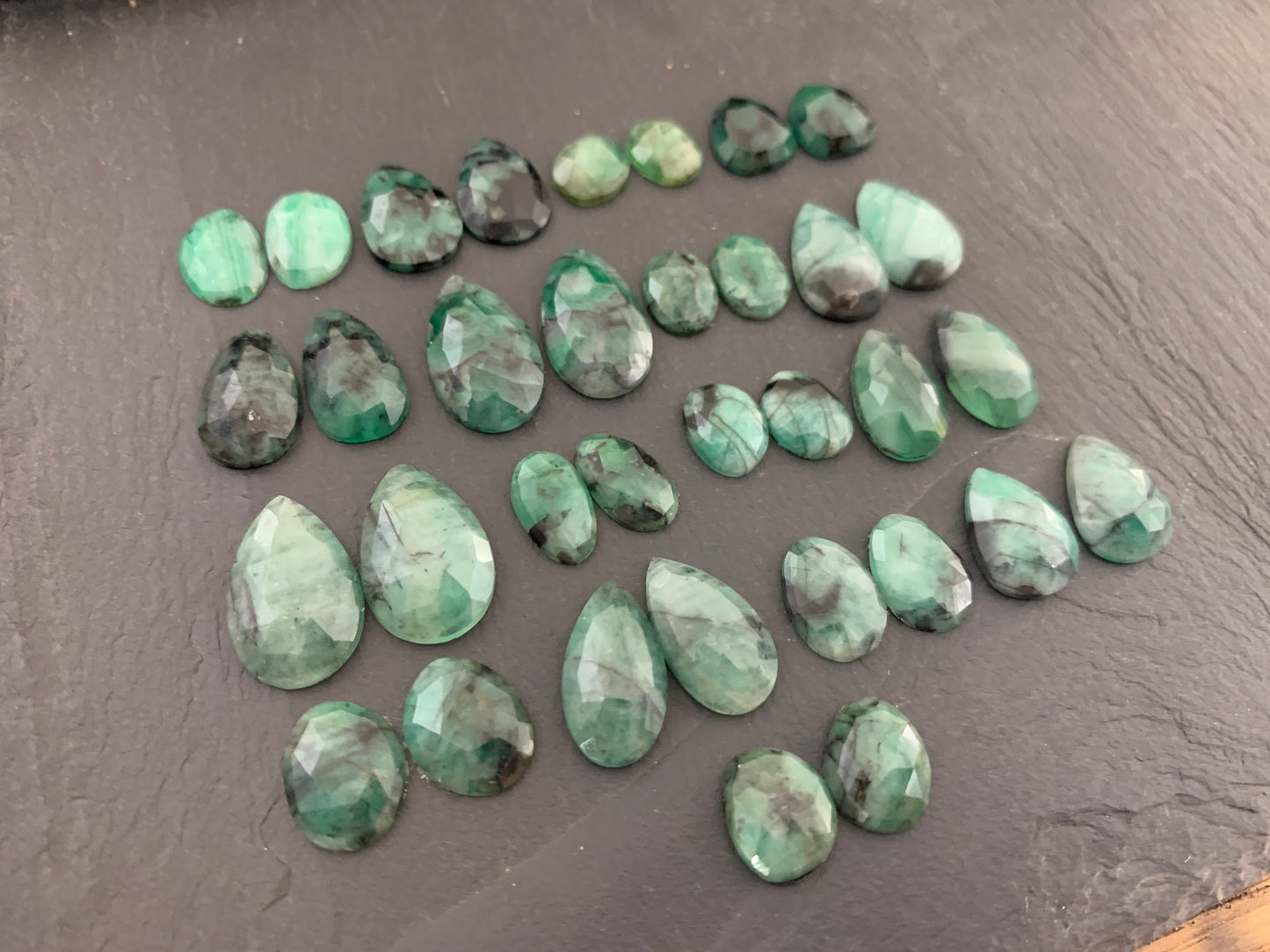 Faceted Emerald pair 9-19mm long cabochon