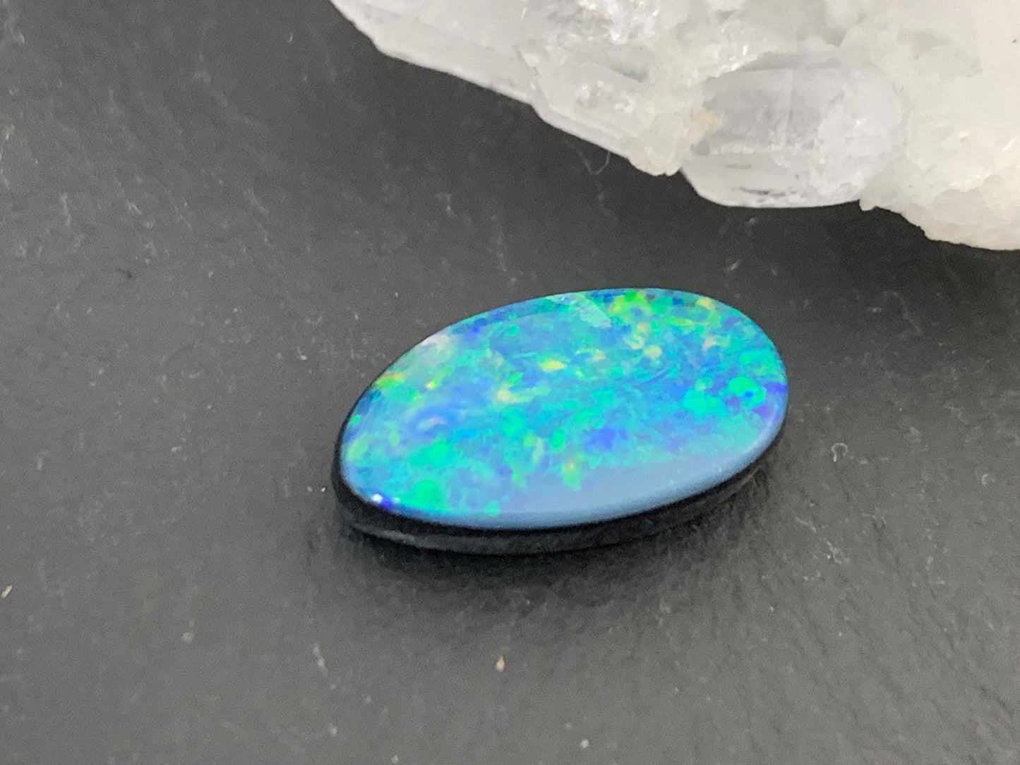 Australian Opal doublet 8x14x4mm cabochon