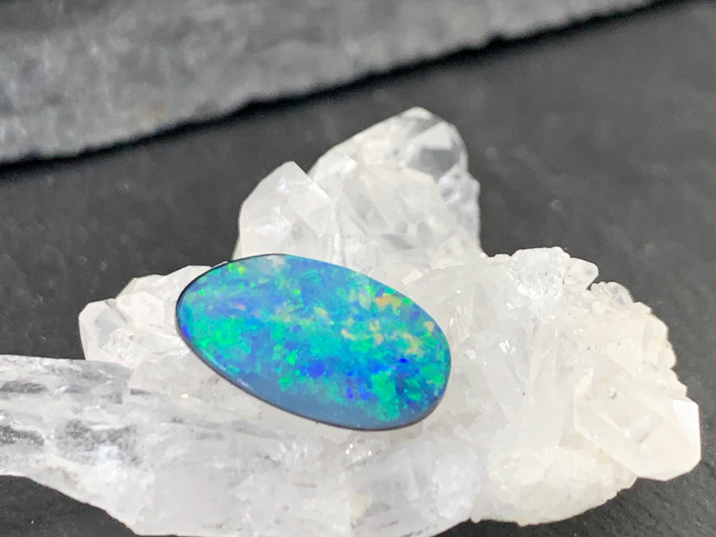 Australian Opal doublet 8x14x4mm cabochon