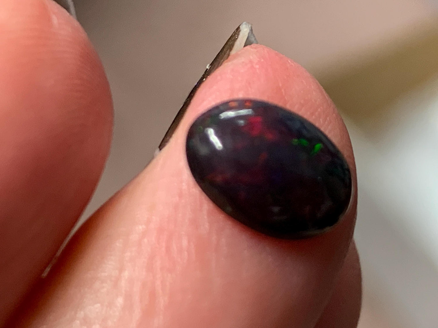 Natural Ethiopian Black Opal 7x9x3mm cabochon