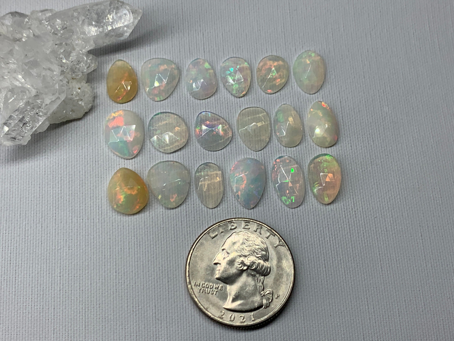 Faceted Ethiopian Opal 10-12mm long cabochon