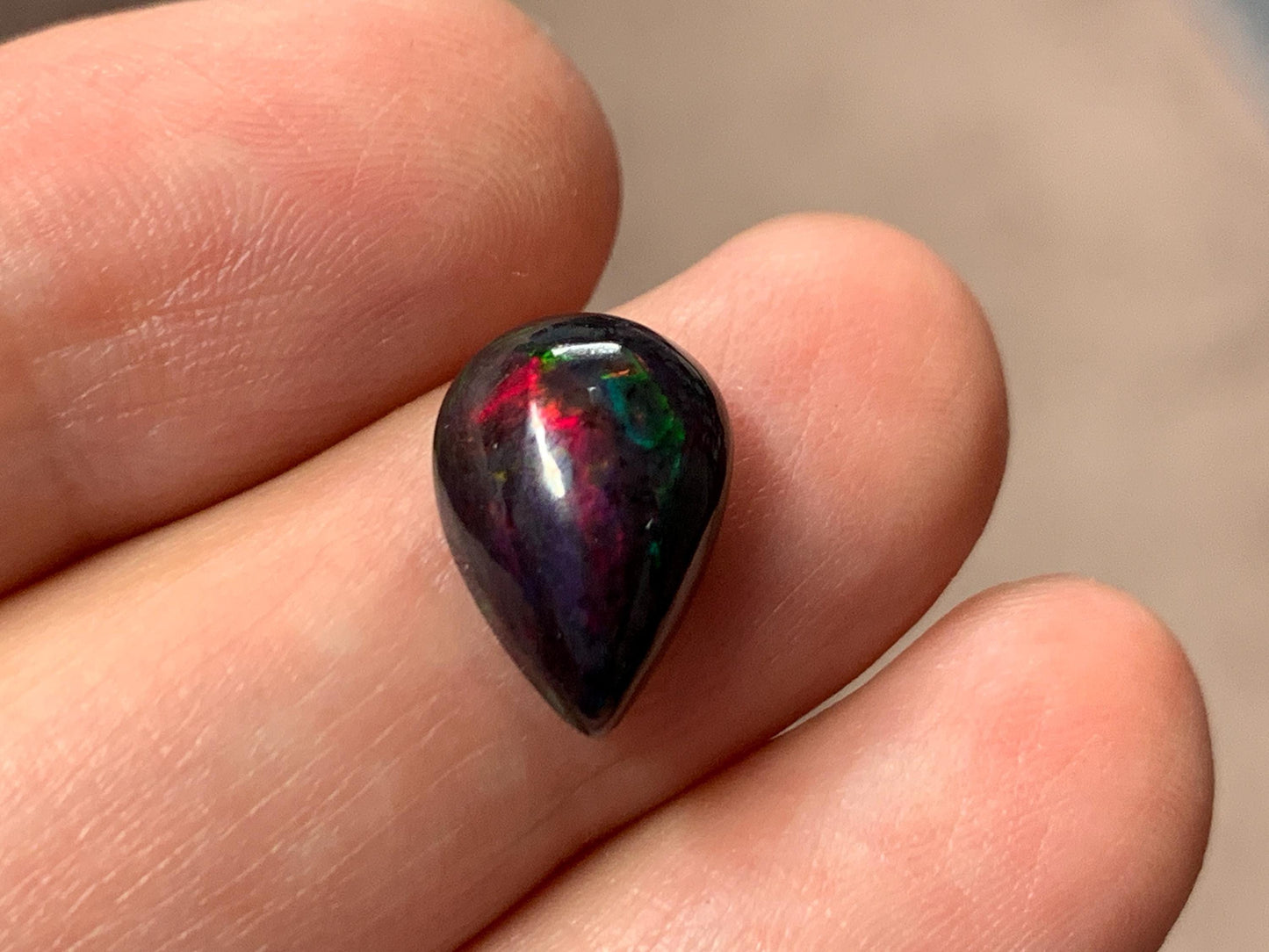 Black Ethiopian Opal pear 9x13x5mm cabochon