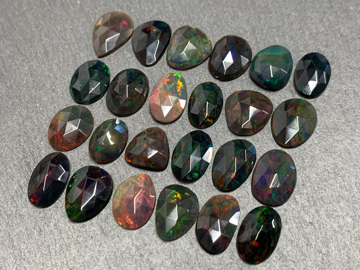 Faceted Black Ethiopian Opal 10-13mm long cabochon