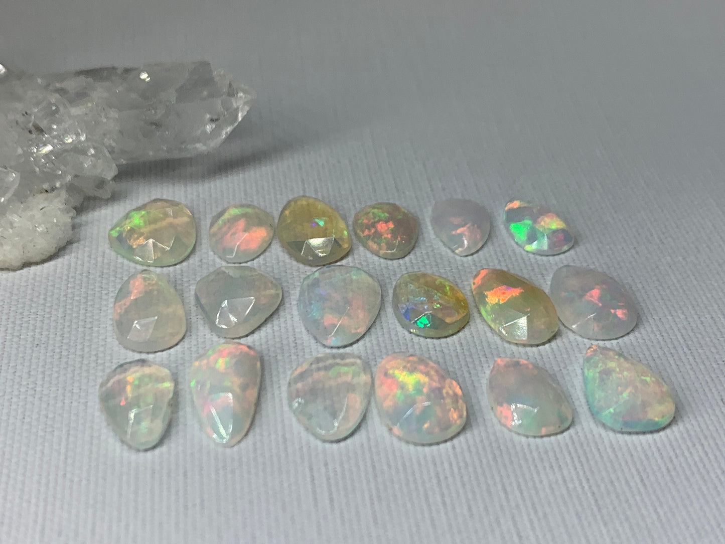 Faceted Ethiopian Opal 8-11mm long cabochon
