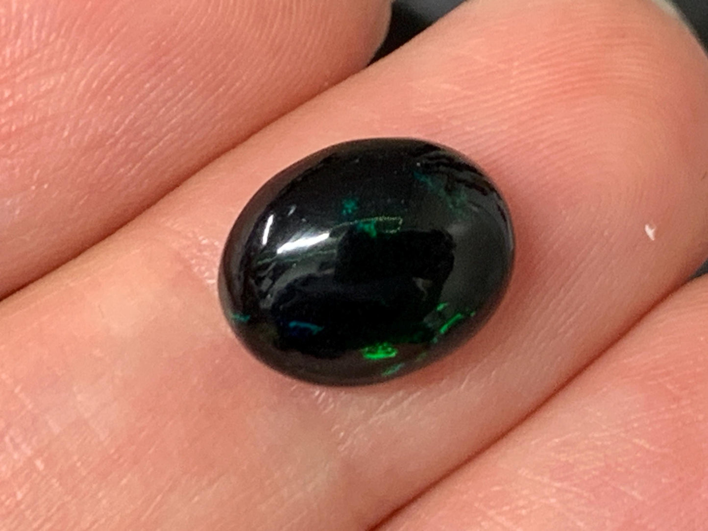 Natural Ethiopian Black Opal 9x11x4mm cabochon