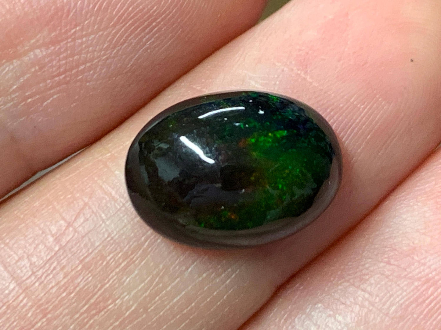 Natural Ethiopian Black Opal 10x14x6mm cabochon