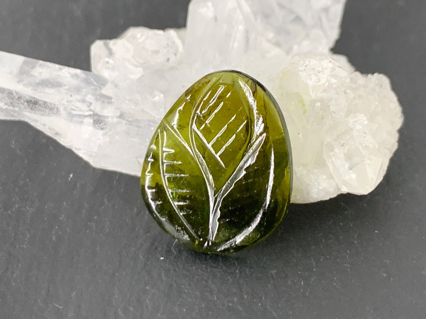 Carved Tourmaline 14x18x2mm cabochon