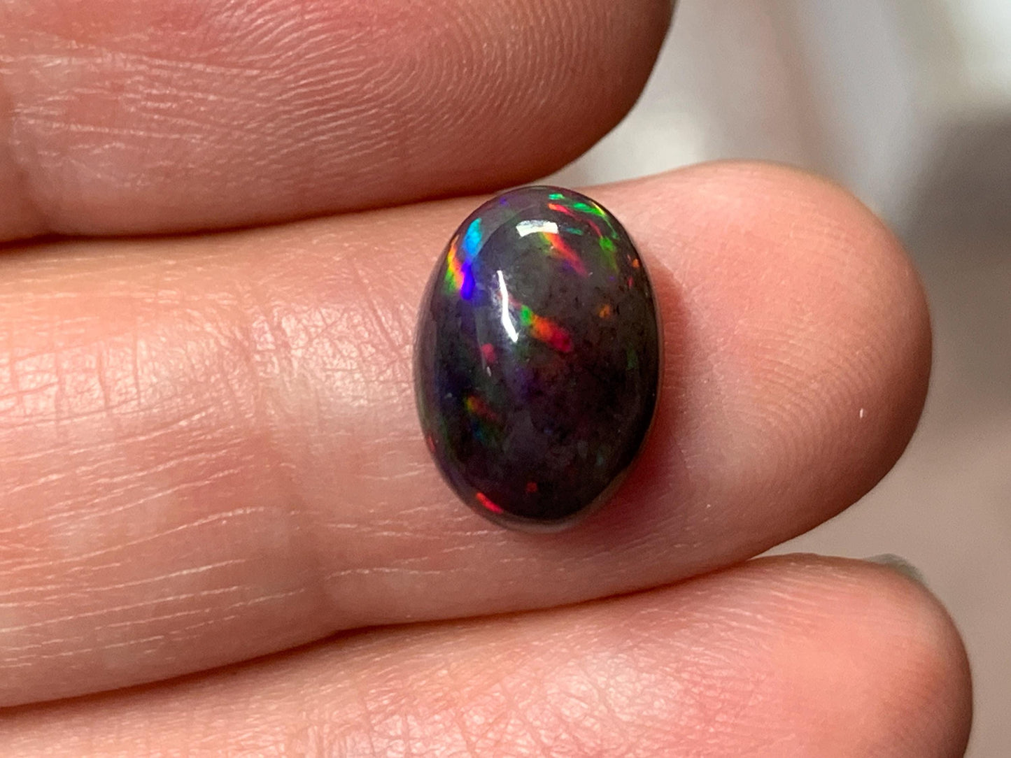 Black Ethiopian Opal oval 8x11x45mm cabochon