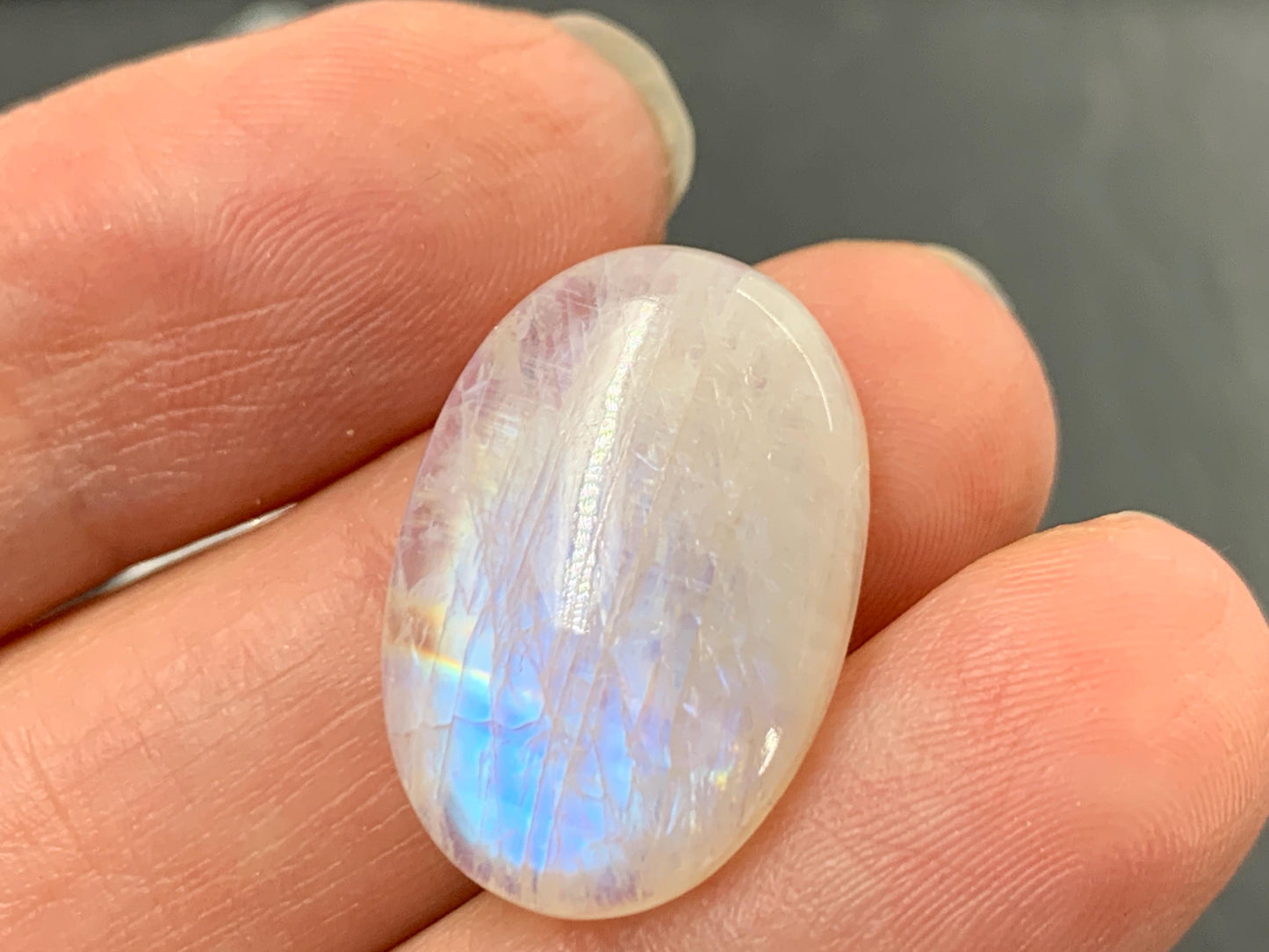 Rainbow Moonstone oval 22x15x6mm cabochon