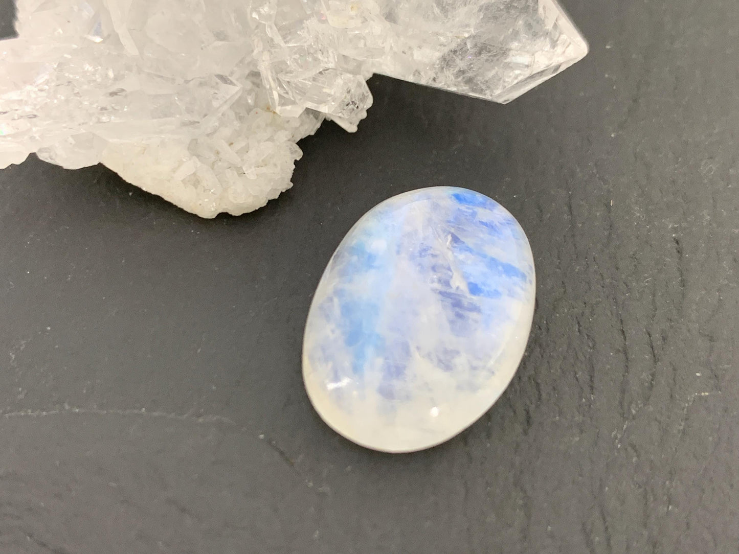 Rainbow Moonstone oval 20x14x6mm cabochon