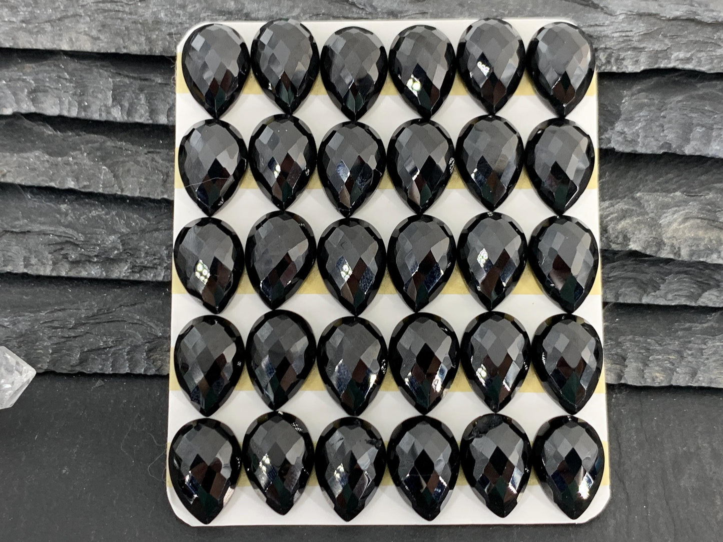 Faceted Black Spinel pear 10x14mm cabochon