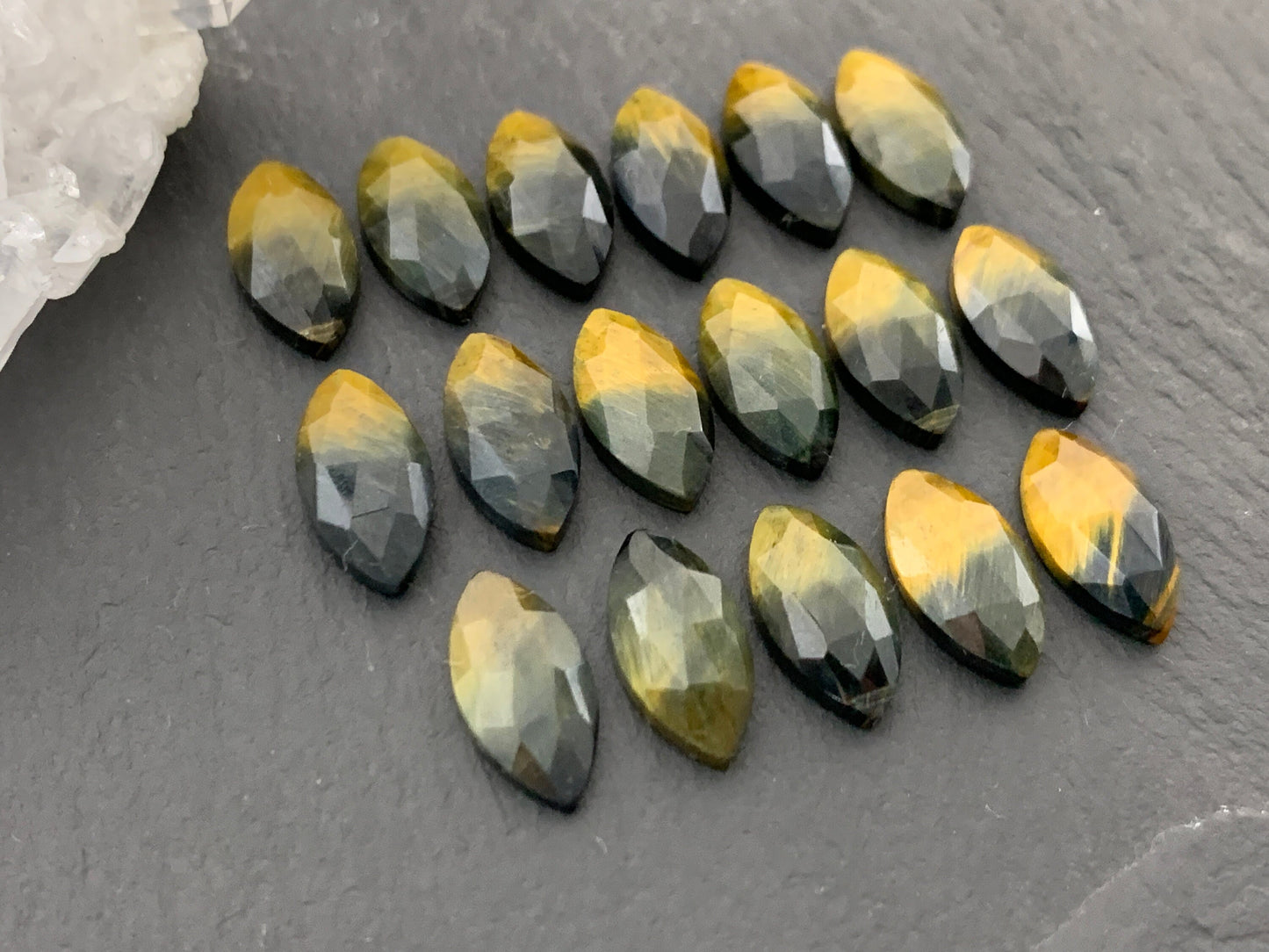 Faceted Yellow Tiger Eye marquise 7x14mm cabochon