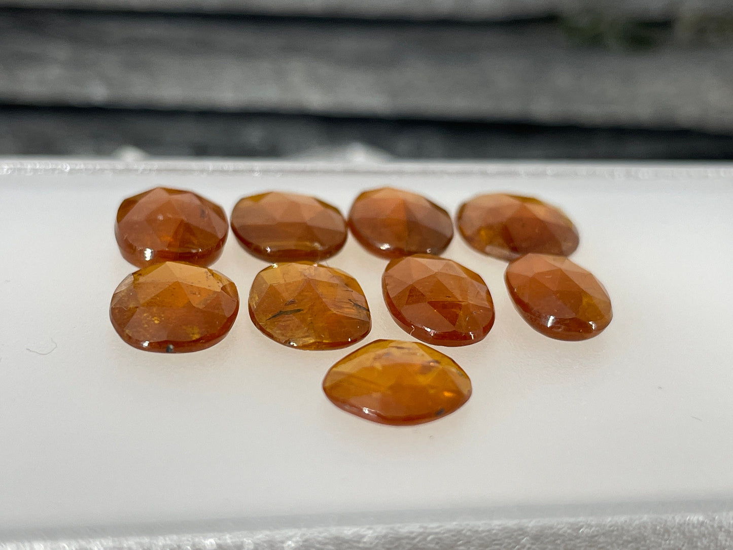 Faceted Orange Kyanite oval 9-12mm long cabochon
