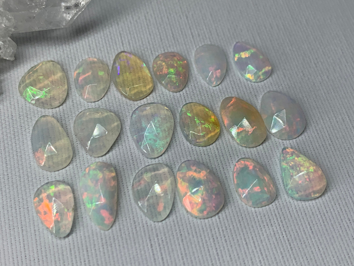 Faceted Ethiopian Opal 8-11mm long cabochon