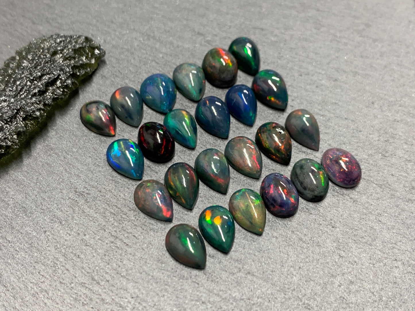 Black Ethiopian Opal pear 8-9mm long cabochon