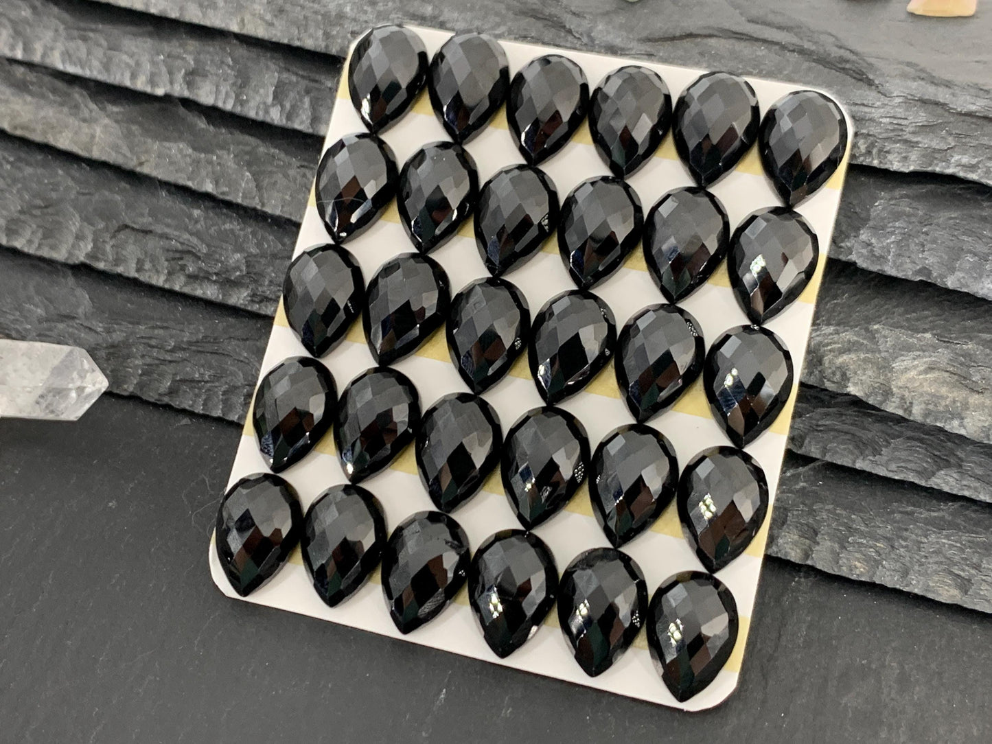 Faceted Black Spinel pear 10x14mm cabochon
