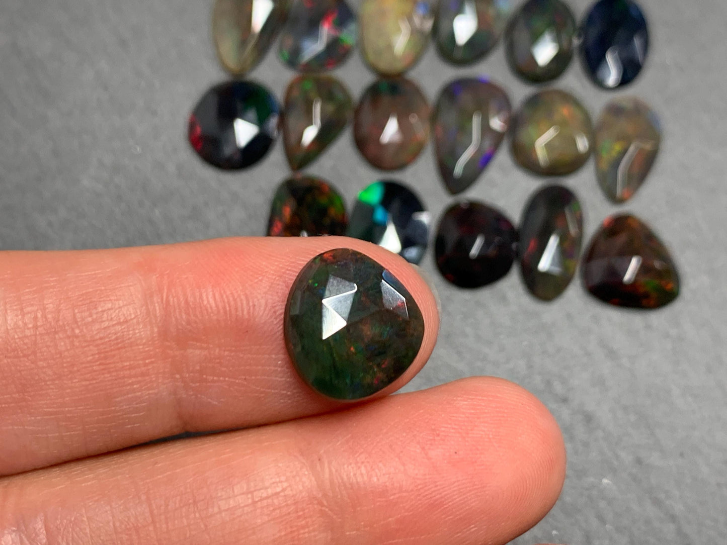 Faceted Black Ethiopian Opal 10-13mm long cabochon