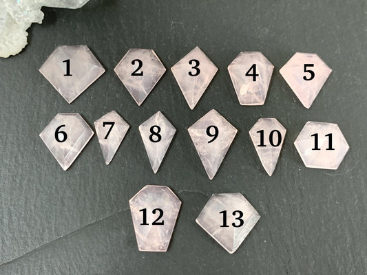Faceted Rose Quartz step cut cabochon.