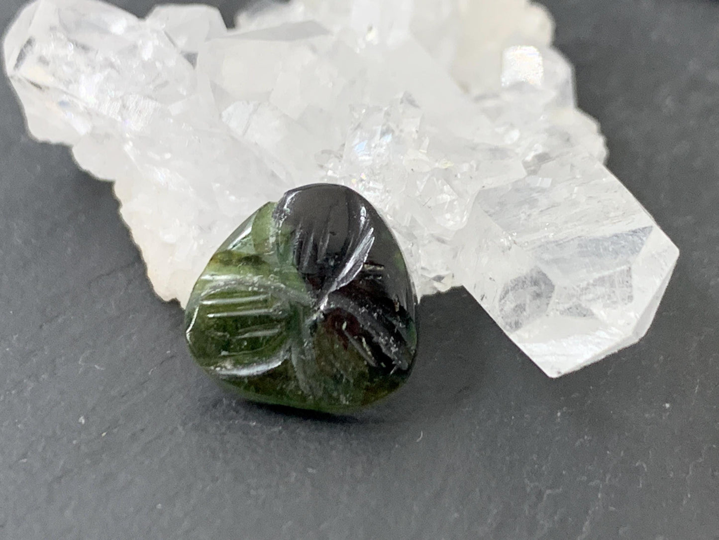 Carved Tourmaline 11x12x2mm cabochon